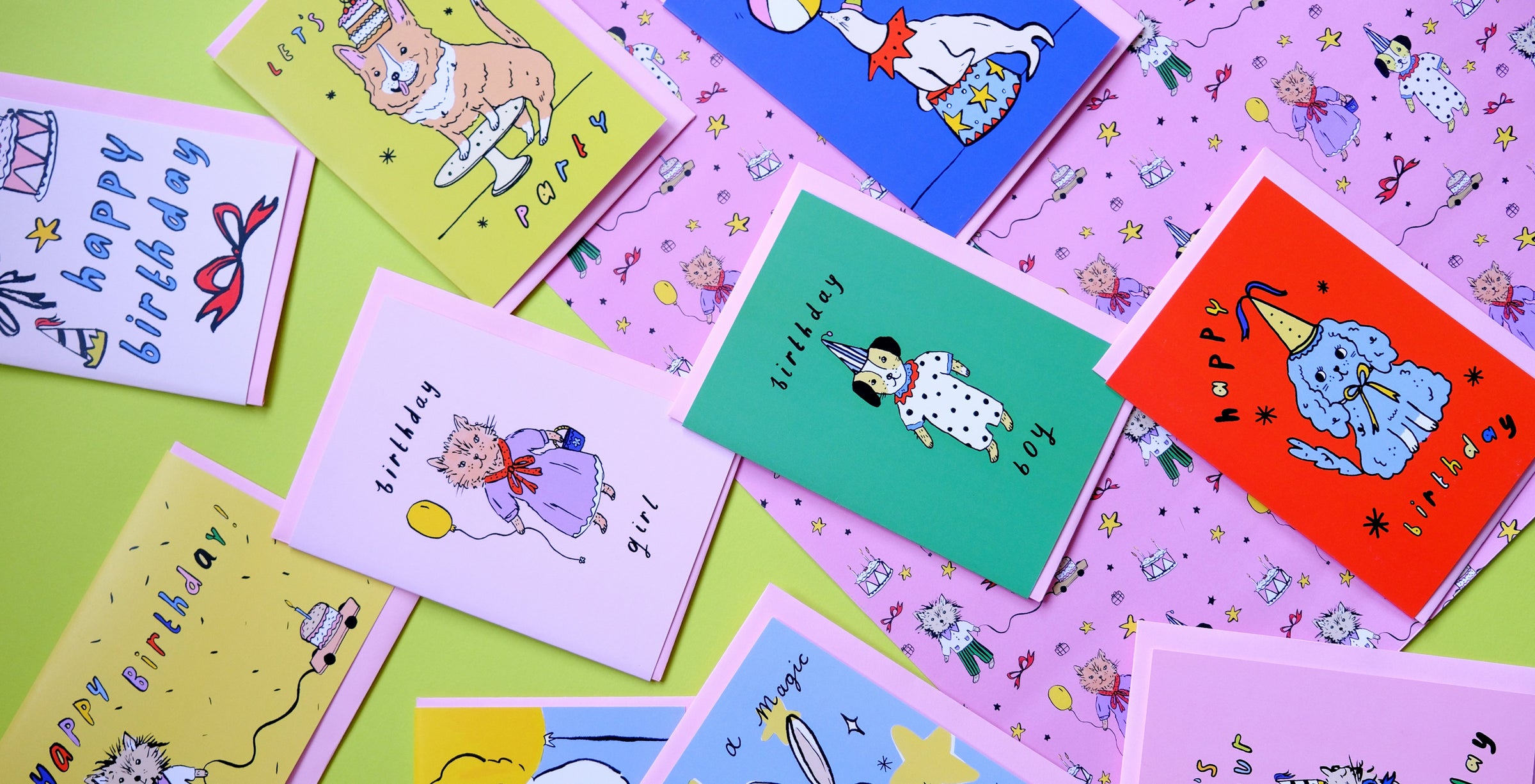 Collection of colorful birthday cards with cartoon illustrations on a multicolored background.